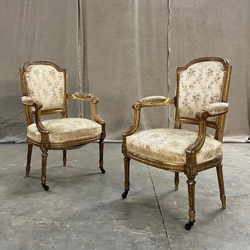 Pair Of Gilded Open Armchairs