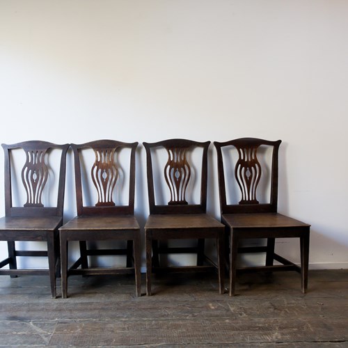 A Set Of Four Dining Chairs 