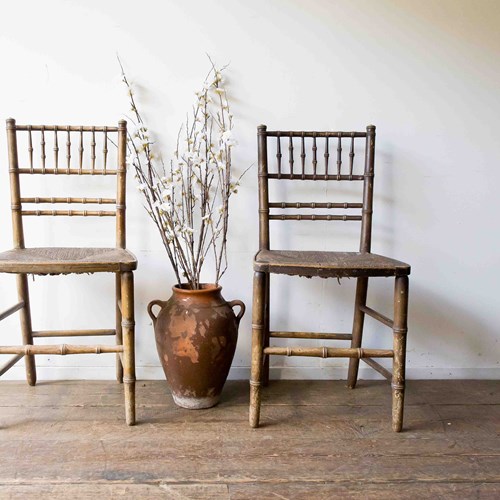 A Pair Of Faux Bamboo Chairs 