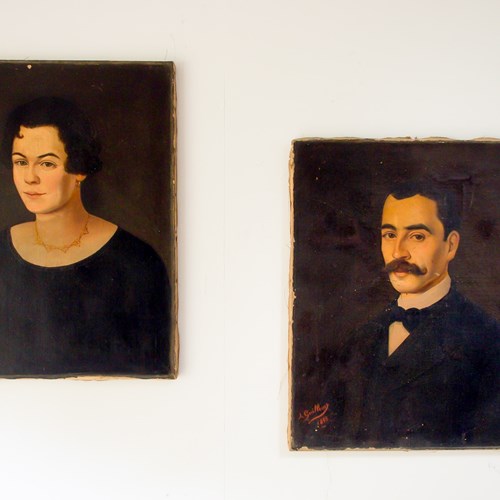 A Pair Of Oil On Canvas Portraits