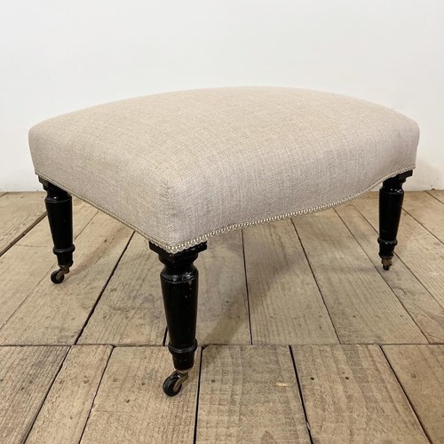 19Th Century French Napoleon Upholstered Curved Linen Footstool With Eboni