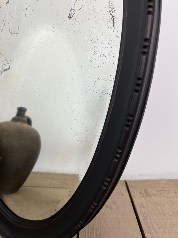 Antique Ebonised Painted Oval Foxed Mirror -vintage-boathouse-a503732b-6e89-4815-95ba-f4fff8a3c031-main-638258402439262565.jpeg