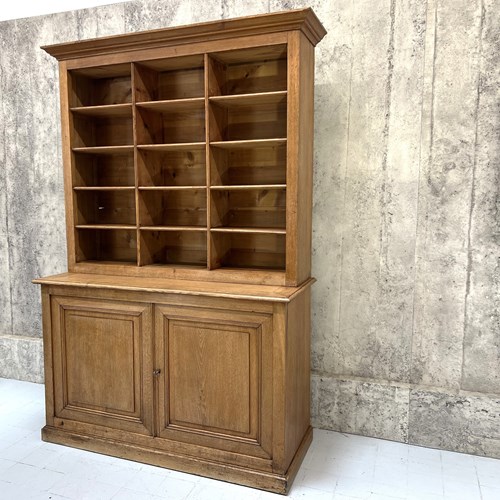 Two Piece Dresser With Cabinets And Pigeon Hole Storage
