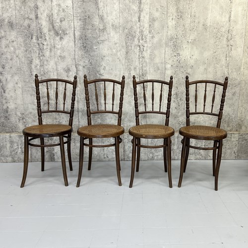 Set Of Four Bentwood Bistro Chairs With Cane Seat Pads