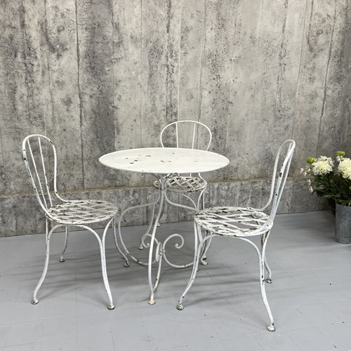 White Painted Metal Garden Table And Three Chairs