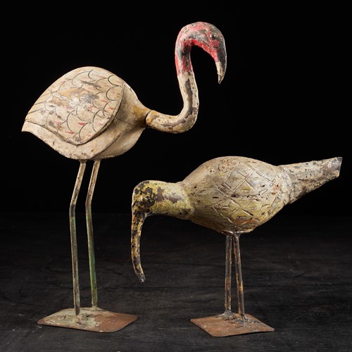 Weather-aged couple of wooden waterbirds 