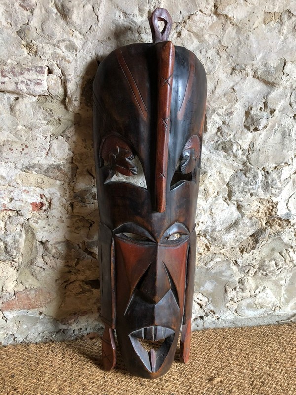 A Large Carved African Mask -y-vintage-1987e71a-82c4-48a8-9459-d2cc960391c6-main-637999620630314379.jpeg