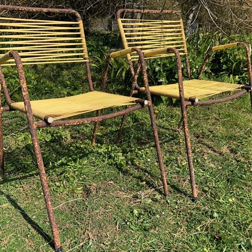 A pair Mid Century Corded Lawn Chairs 