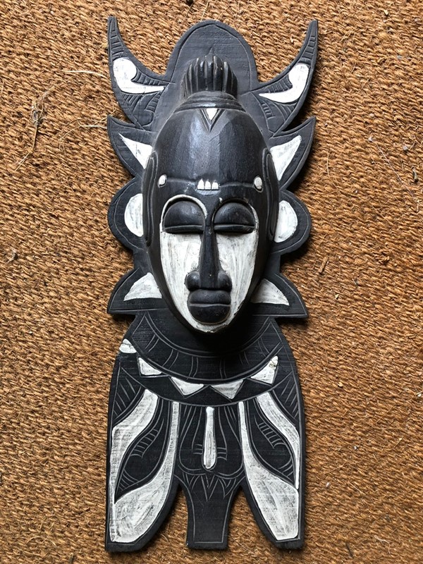 A Black and White Carved Mask -y-vintage-a6847268-461f-479f-b91c-e419693d6c39-main-637998978324770457.jpeg