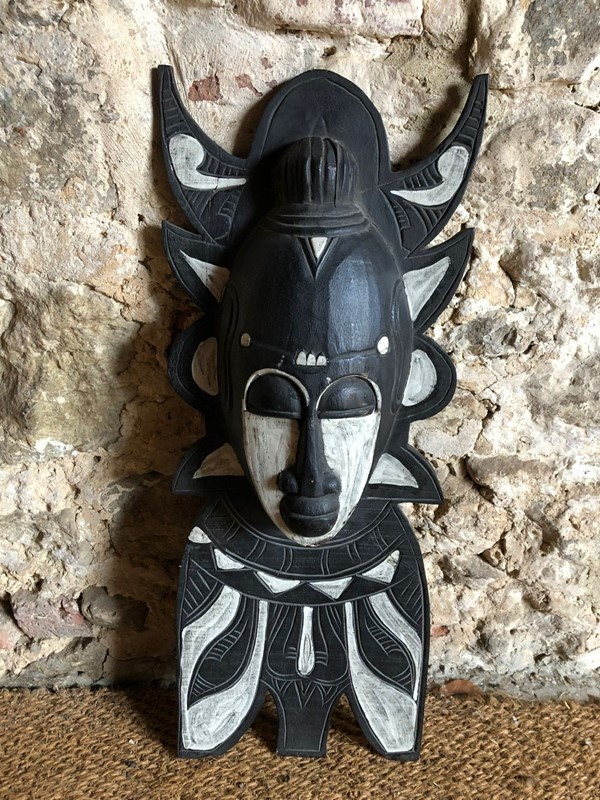 A Black and White Carved Mask -y-vintage-e5b08505-015b-4354-8624-80316bb4916a-main-637998978357426337.jpeg
